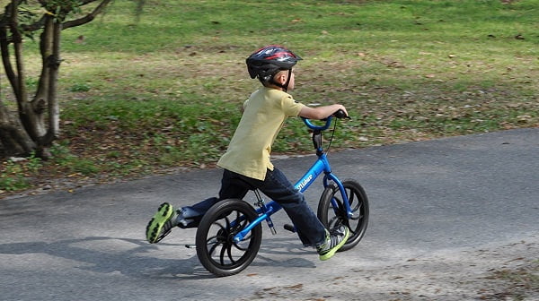 scooting and Lifting kid’s feet up